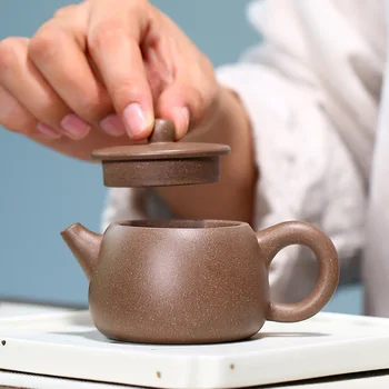 100 ml Kitajski Yixing Vijolično Gline Čajniki Žogo Oblikovan Infuser Čaj Pot Lepote grelnik vode Surove Rude Ročno Zisha Čaj Nastavite po Meri